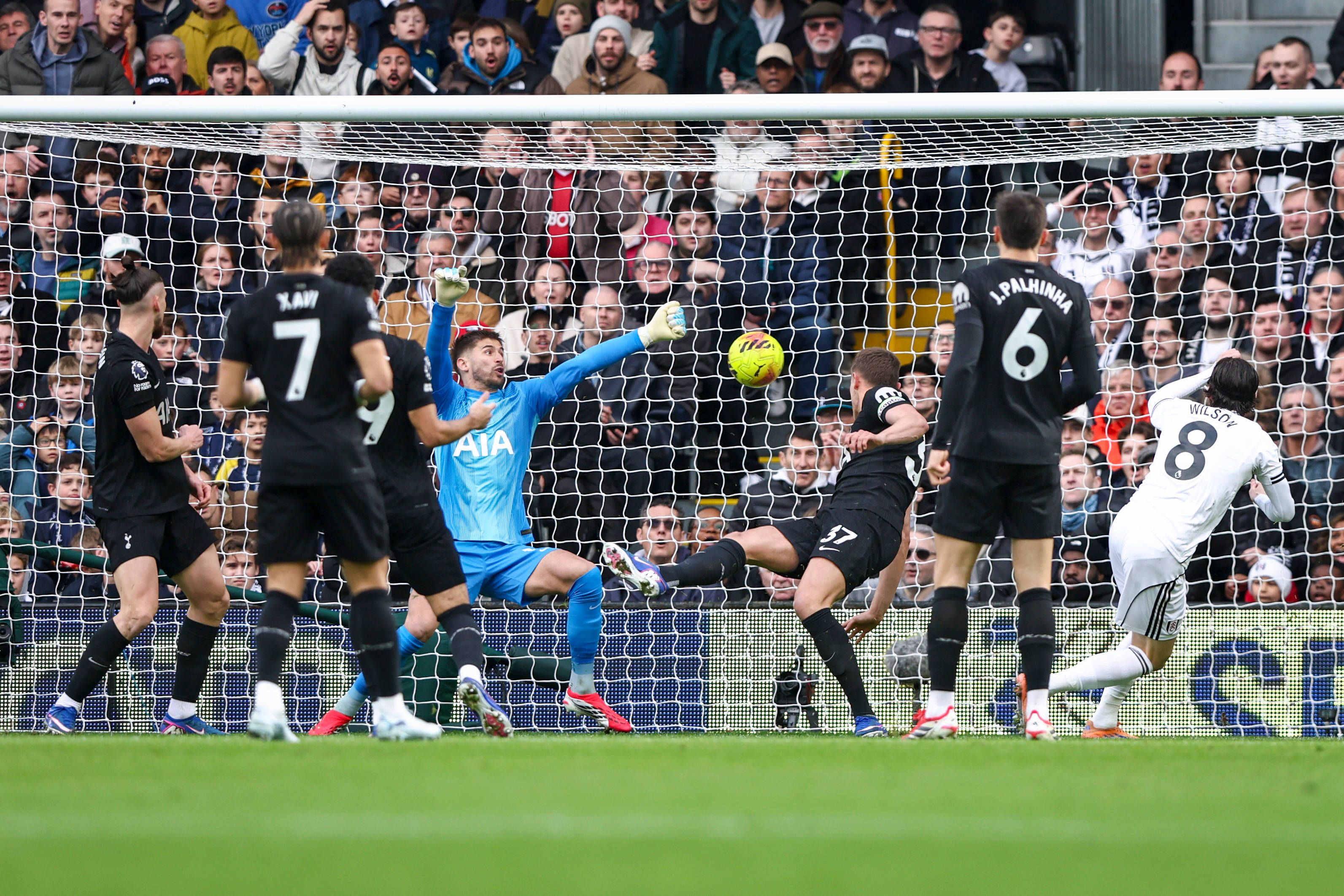 Harry Wilson scores during the Fulham v Tottenham Hotspur Premier League match at Craven Cottage