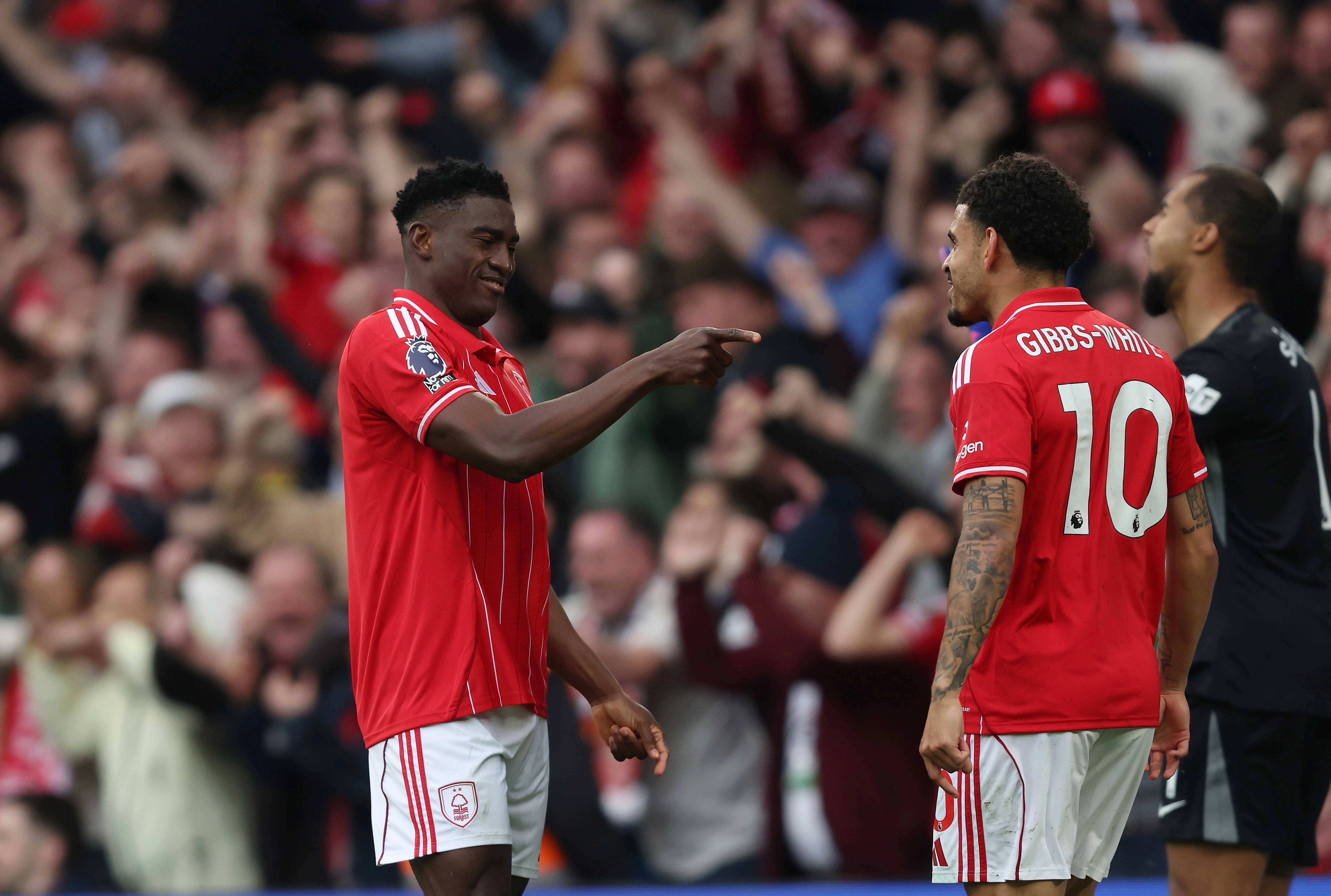 Taiwo Awoniyi of Nottingham Forest celebrates his goal with Morgan Gibbs-White
