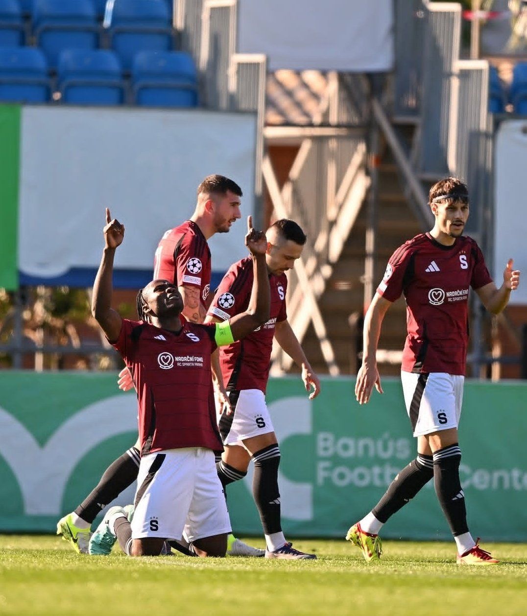 Emmanuel Uchenna on his knees, celebrates his goal for Sparta Prague vs Malmo FF. Photo Credit X