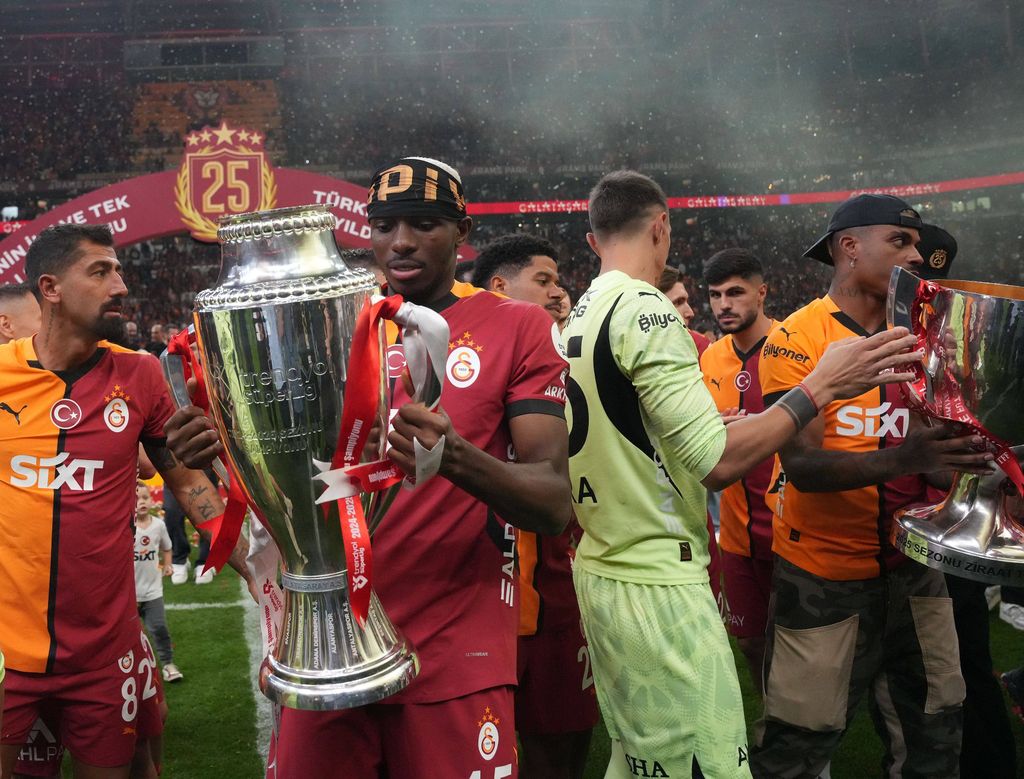 Galatasaray players celebrated with the championship trophy in their home stadium and in front of their fans after the Turkish Super League match between Galatasaray and Basaksehir FK at Rams Park Stadium. Victor Osimhen