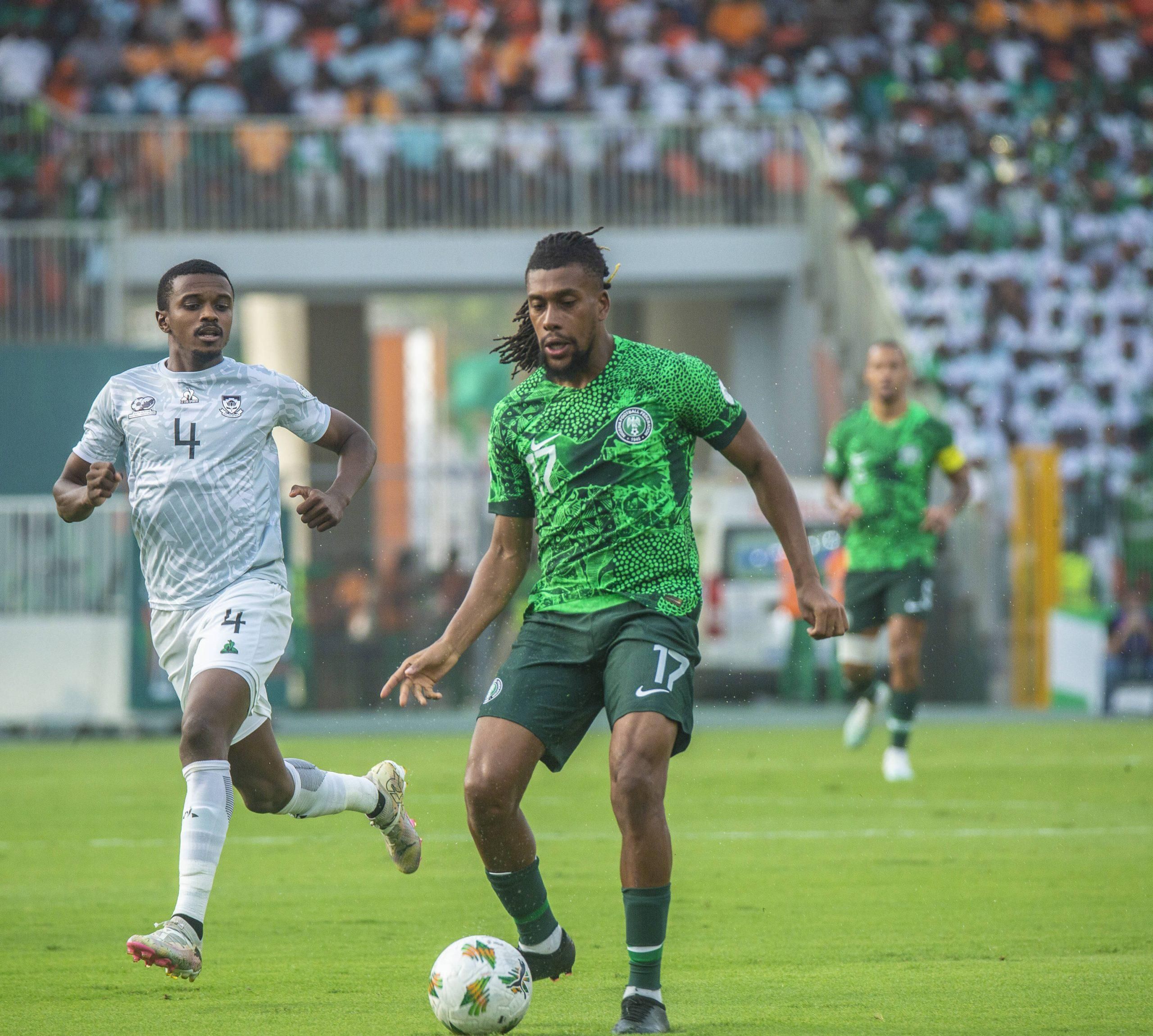 Alex Iwobi for Nigeria with Teboho Mokoena behind