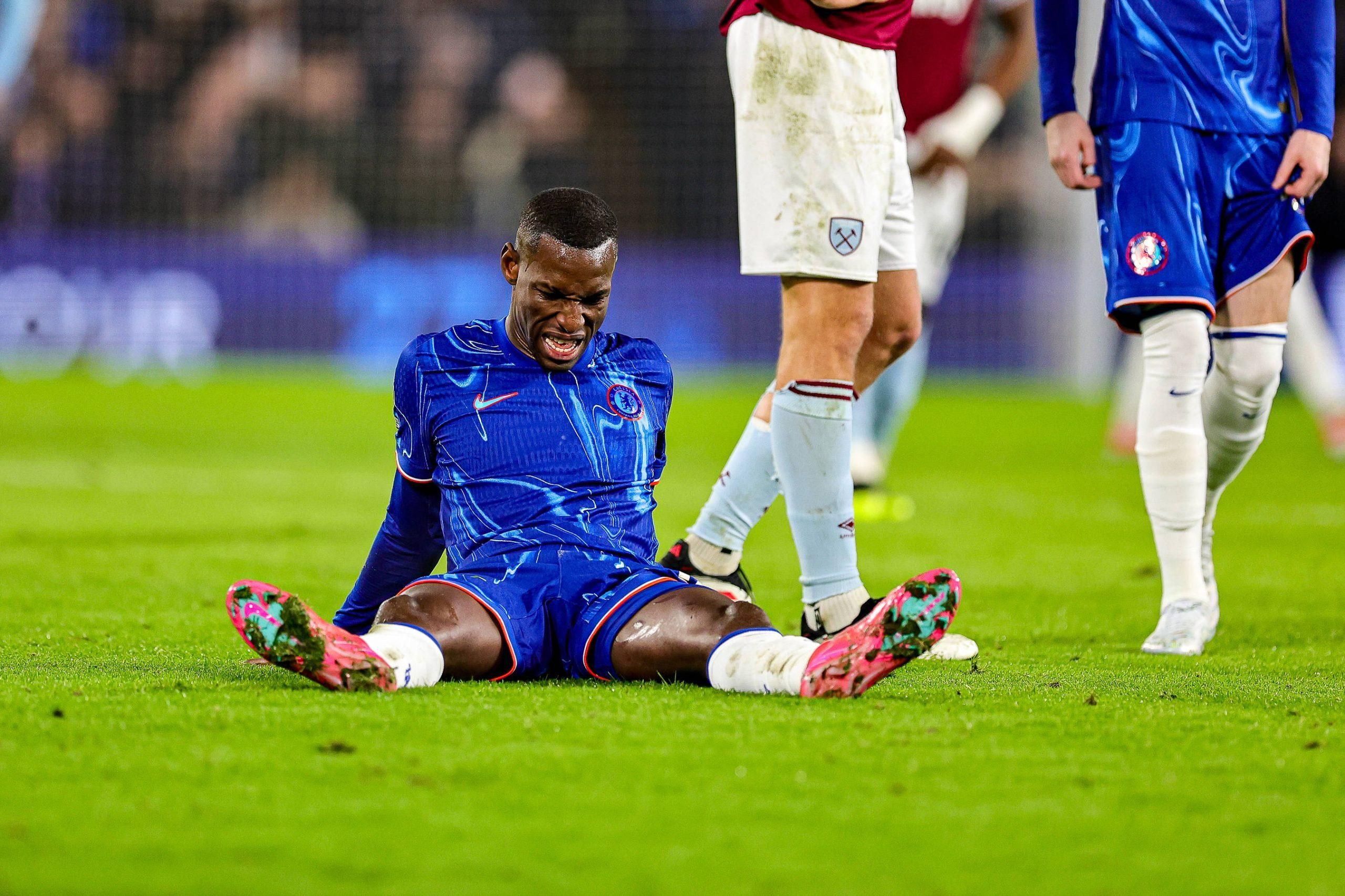 Nicolas Jackson is injured during the Premier League match between Chelsea and West Ham United
