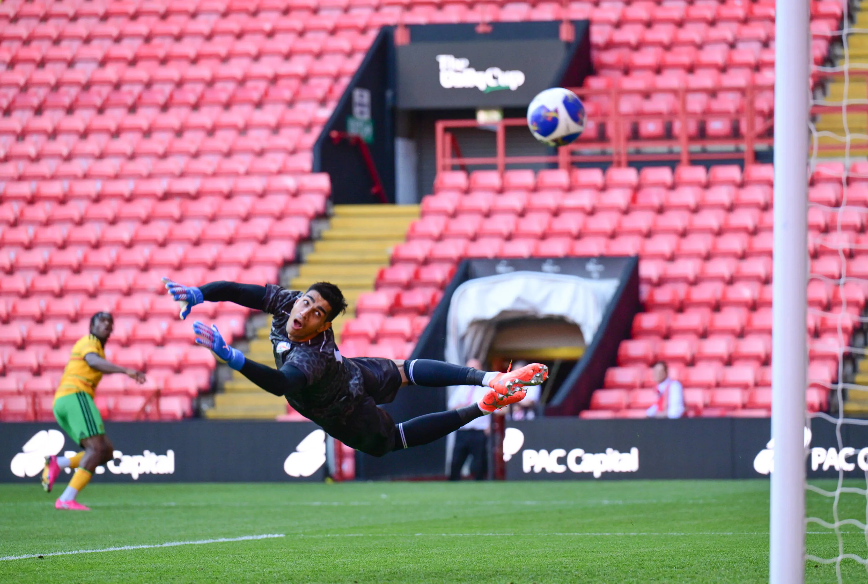 Courtney Clarke of Jamaica shoots from deep to score