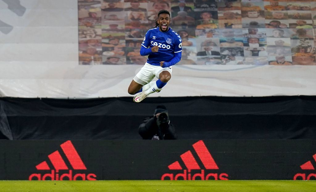 Alex Iwobi celebrates scoring his side's first goal of the game during the Premier League