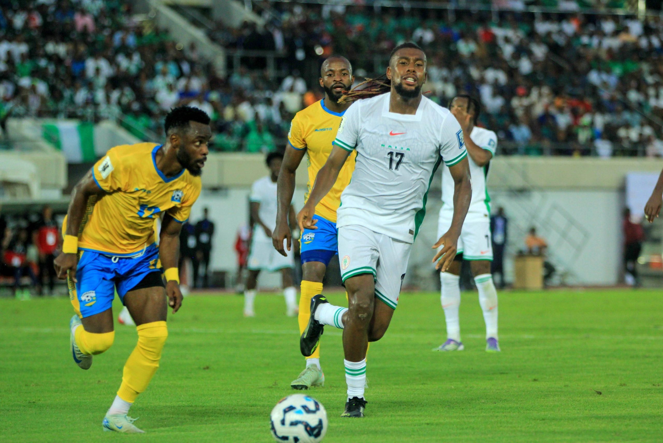 Alex Iwobi of Nigeria and Gilbert Mugisha of Rwanda during the 2026 FIFA World Cup qualifying match between the Super Eagles of Nigeria and the Amavubi of Rwanda