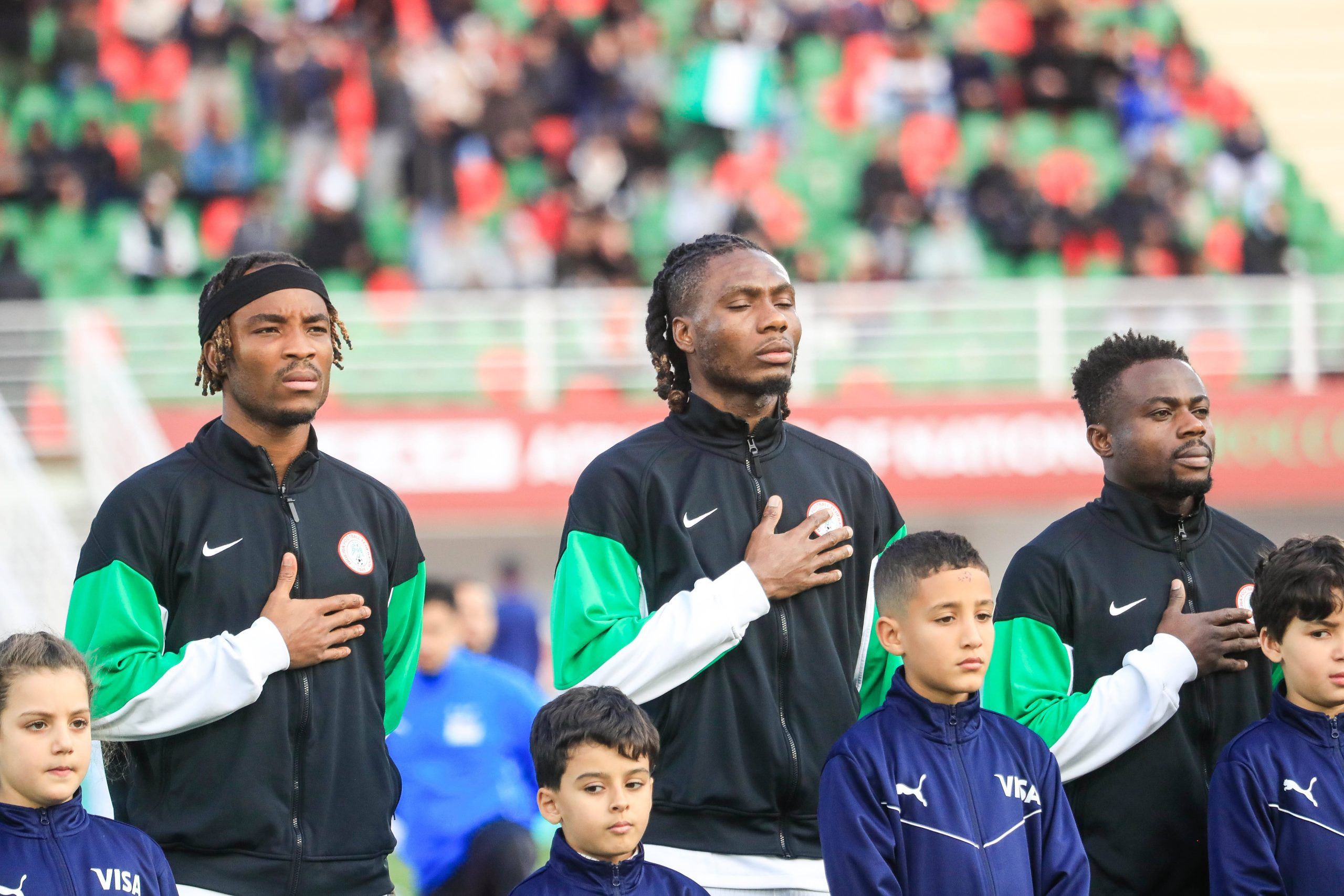 Onyemaechi Bruno, Ogbu Igoh and Moses Simon during the AFCON 2025 match between Uganda and Nigeria