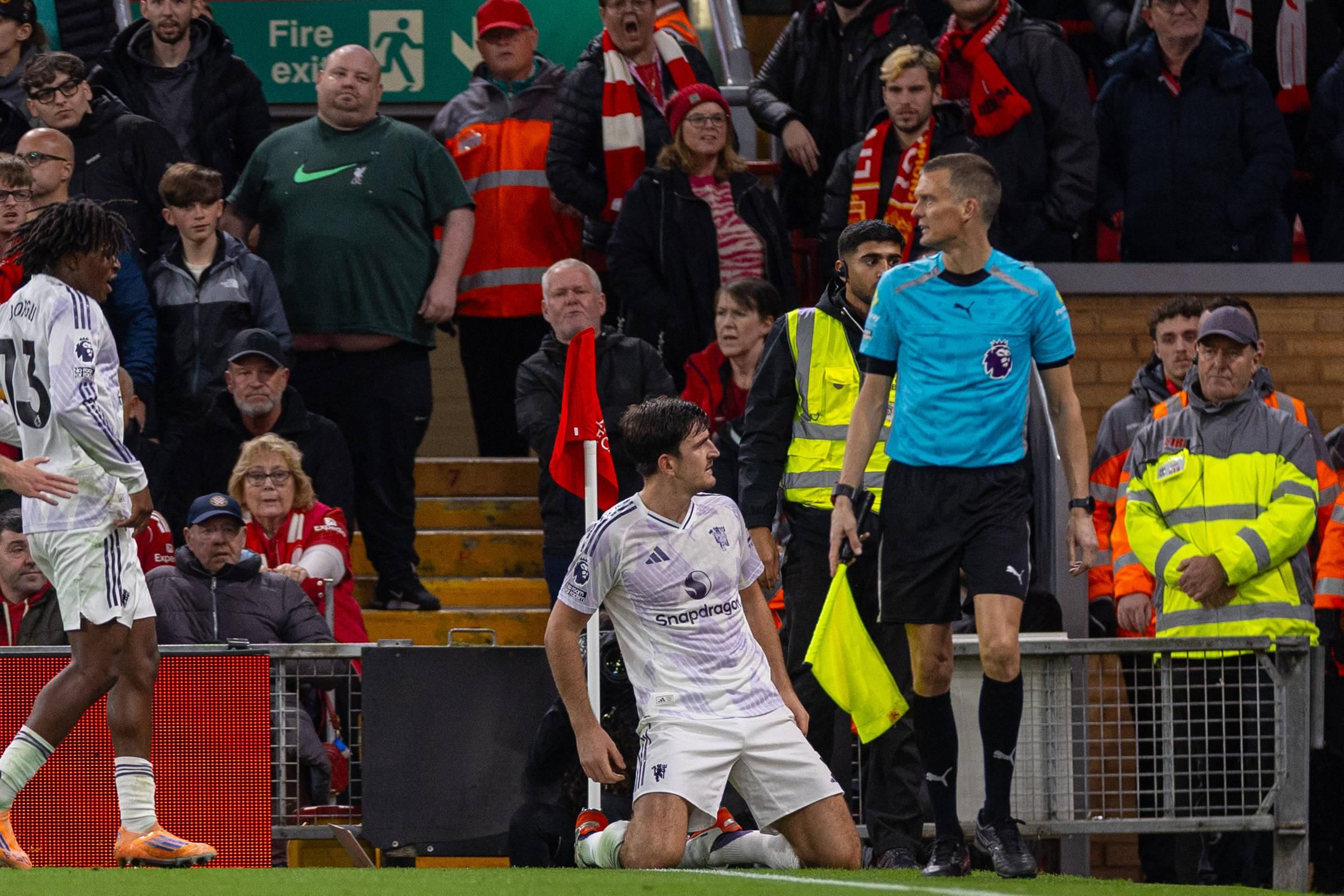 Harry Maguire celebrates after scoring the second goal during the FA Premier League match between Liverpool FC and Manchester United FC