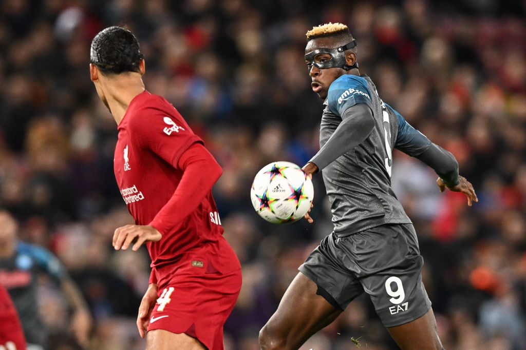 Victor Osimhen pictured (right) in action for Napoli against Liverpool in 2022