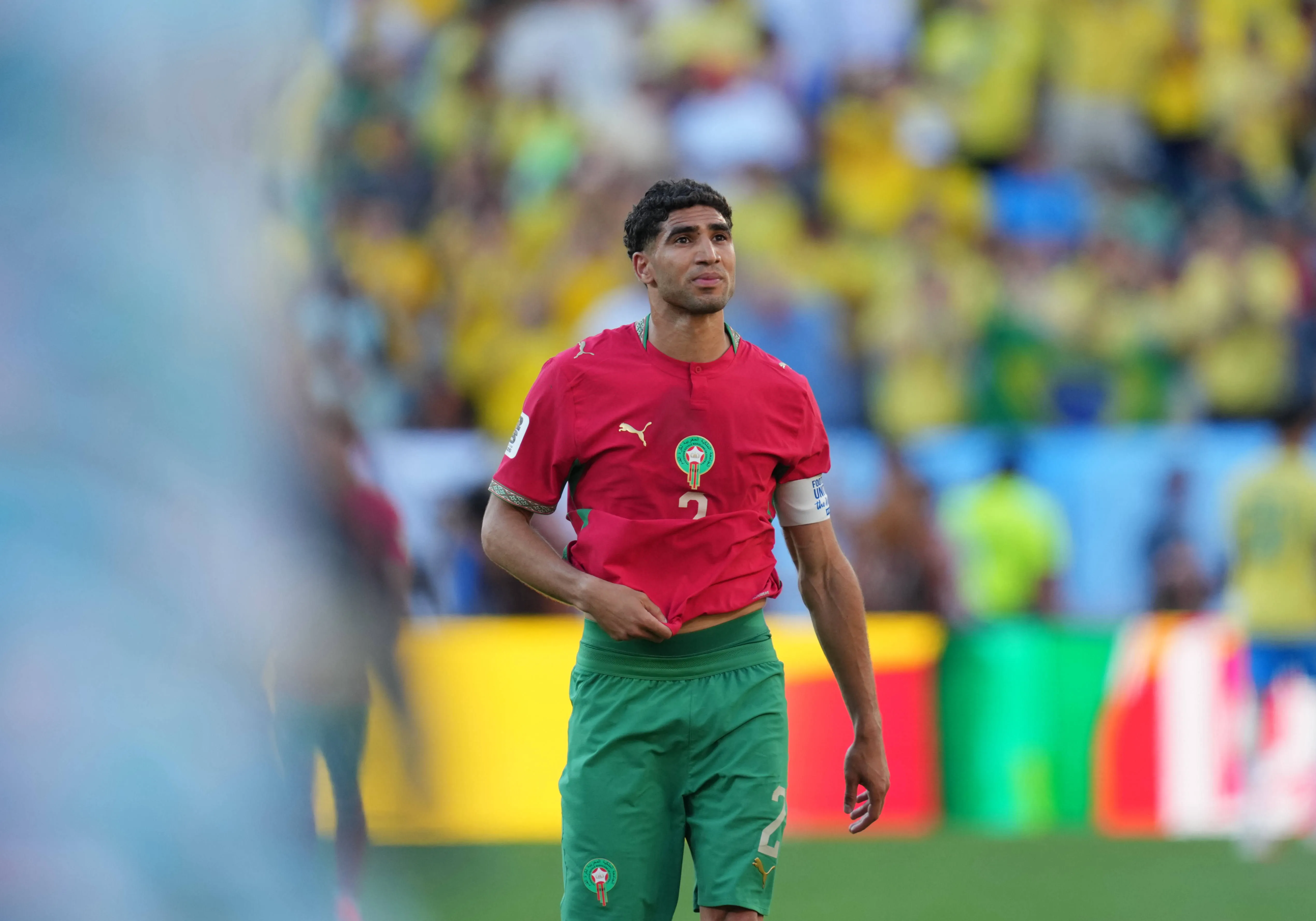 Achraf Hakimi looks on