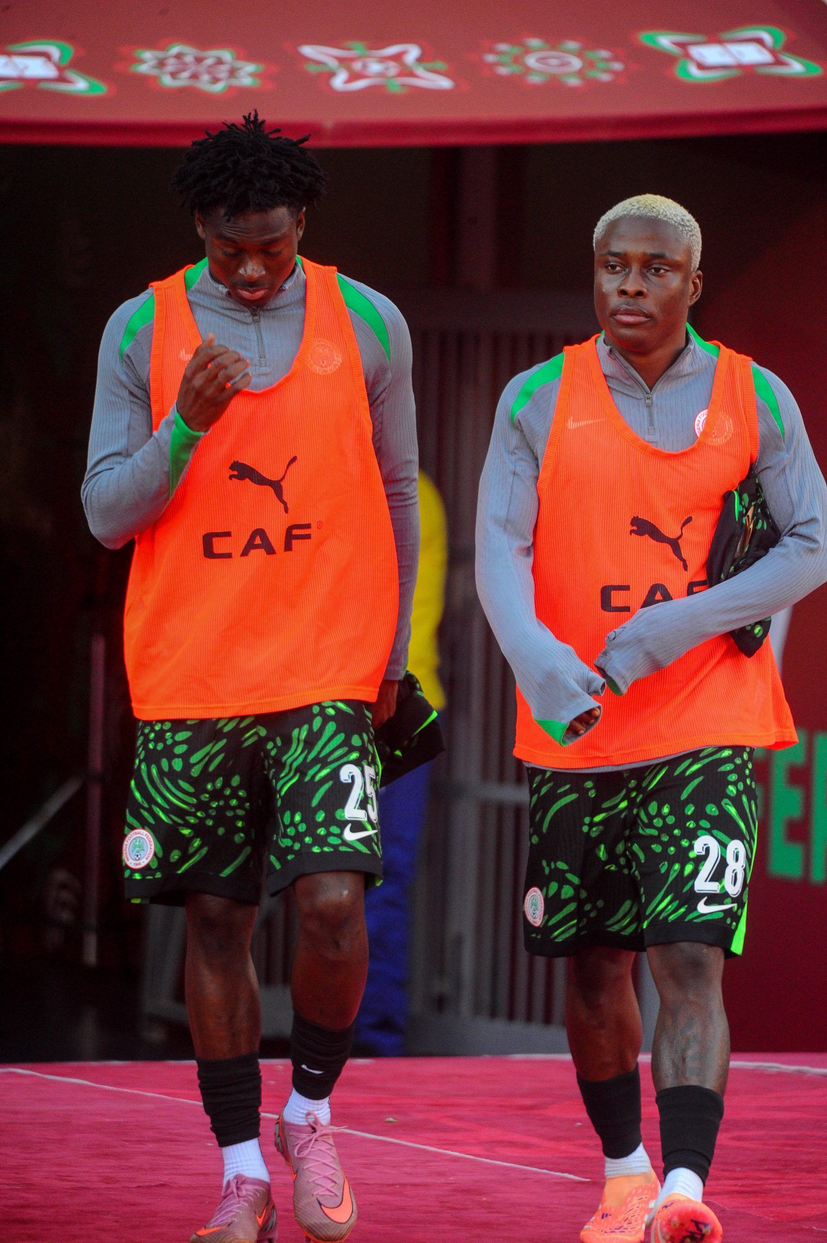 Salim Fago Lawal and Tochukwu Nnadi during AFCON match between Algeria and Nigeria.