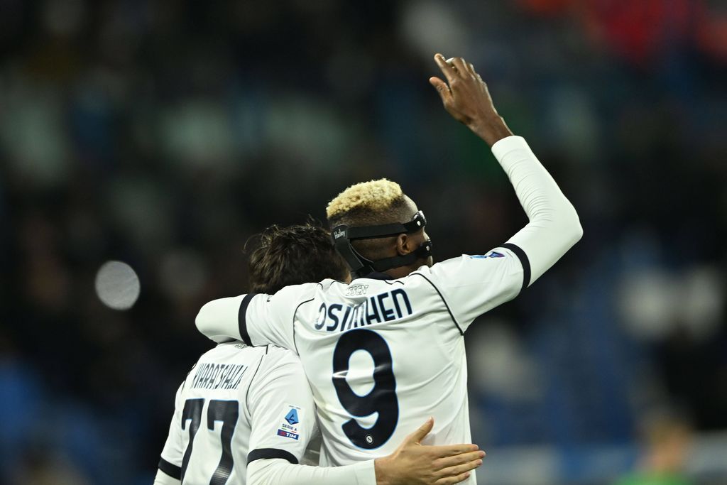 Victor Osimhen and Khvicha Kvaratskhelia celebrates after scoring his team's fourth goal during the Italian Serie A match between Sassuolo 1-6 Napoli at Mapei Stadium on