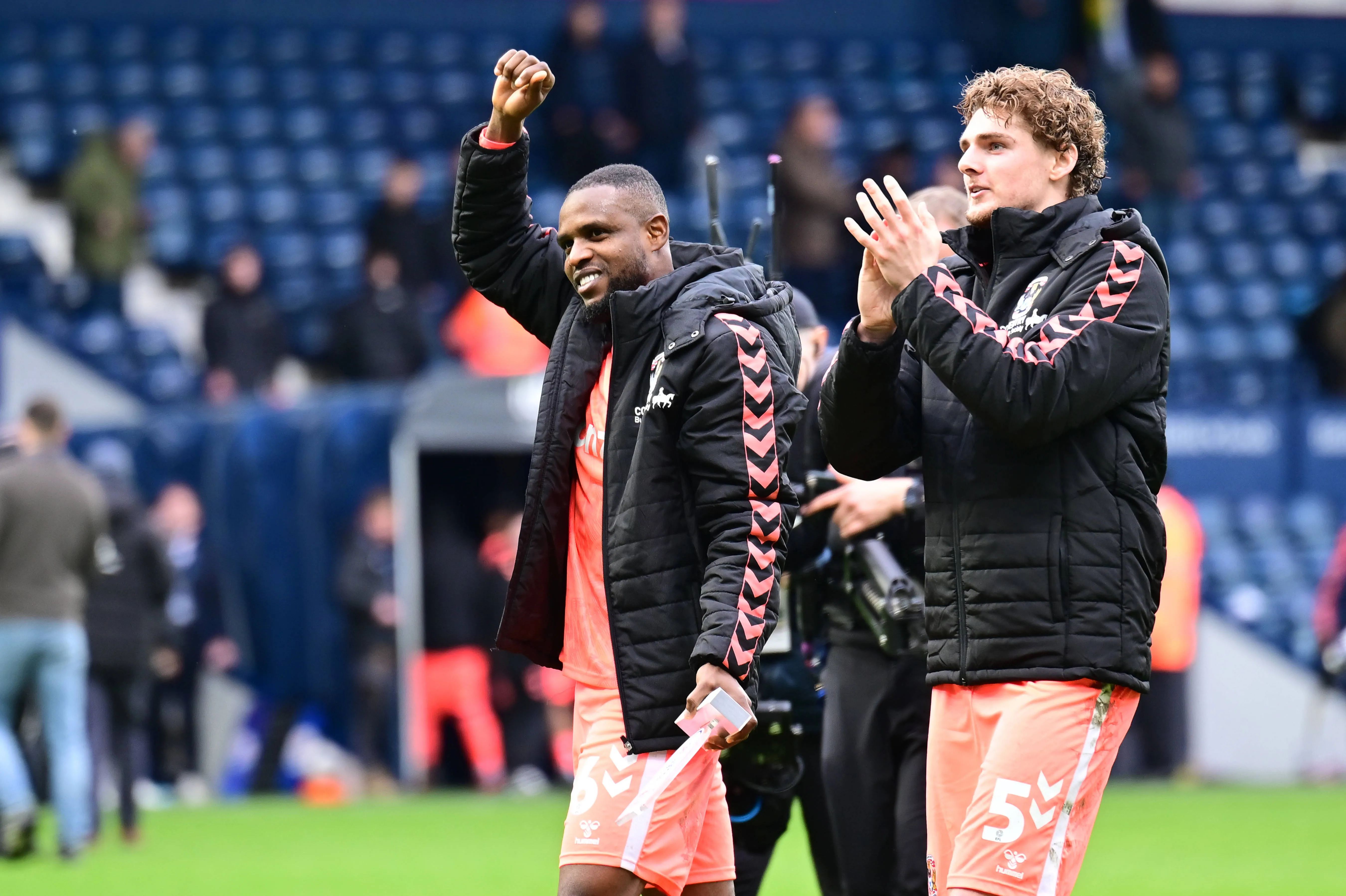 Frank Onyeka and Jack Rudoni applaud their fans in the match between West Bromwich Albion and Coventry City