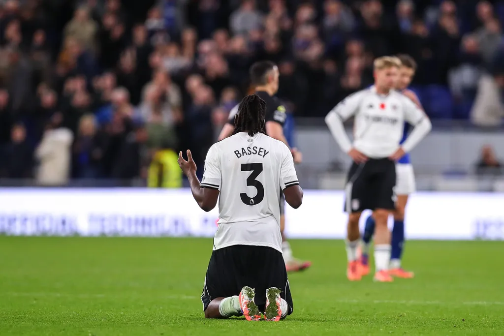 Calvin Bassey prays after the Everton v Fulham