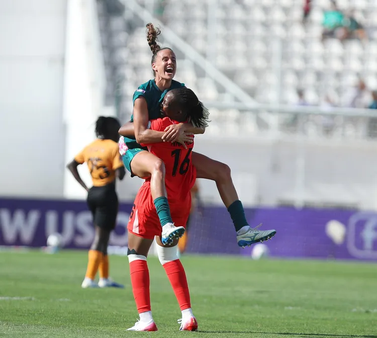 Super Falcons stars Ashleigh Plumptre and goalkeeper Chiamaka Nnadozie 