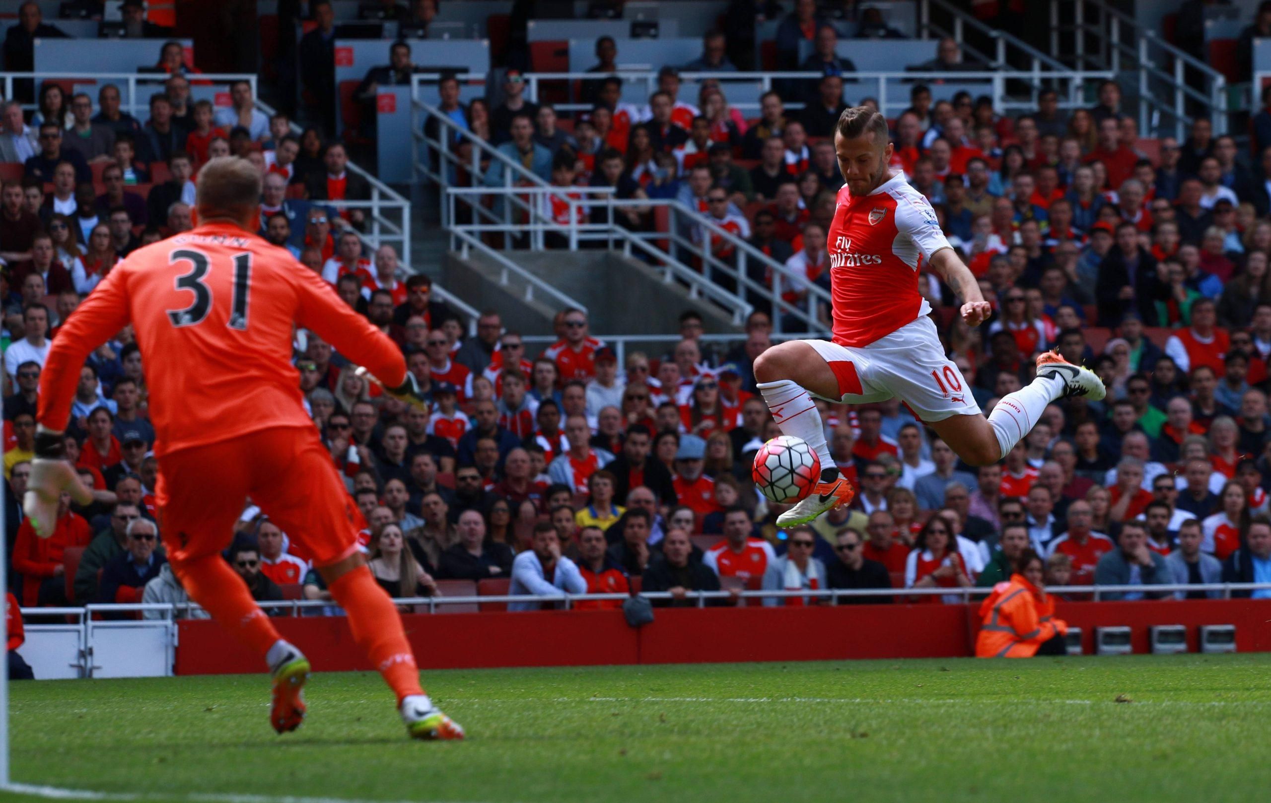 Jack Wilshere fires in a shot during a game for Arsenal