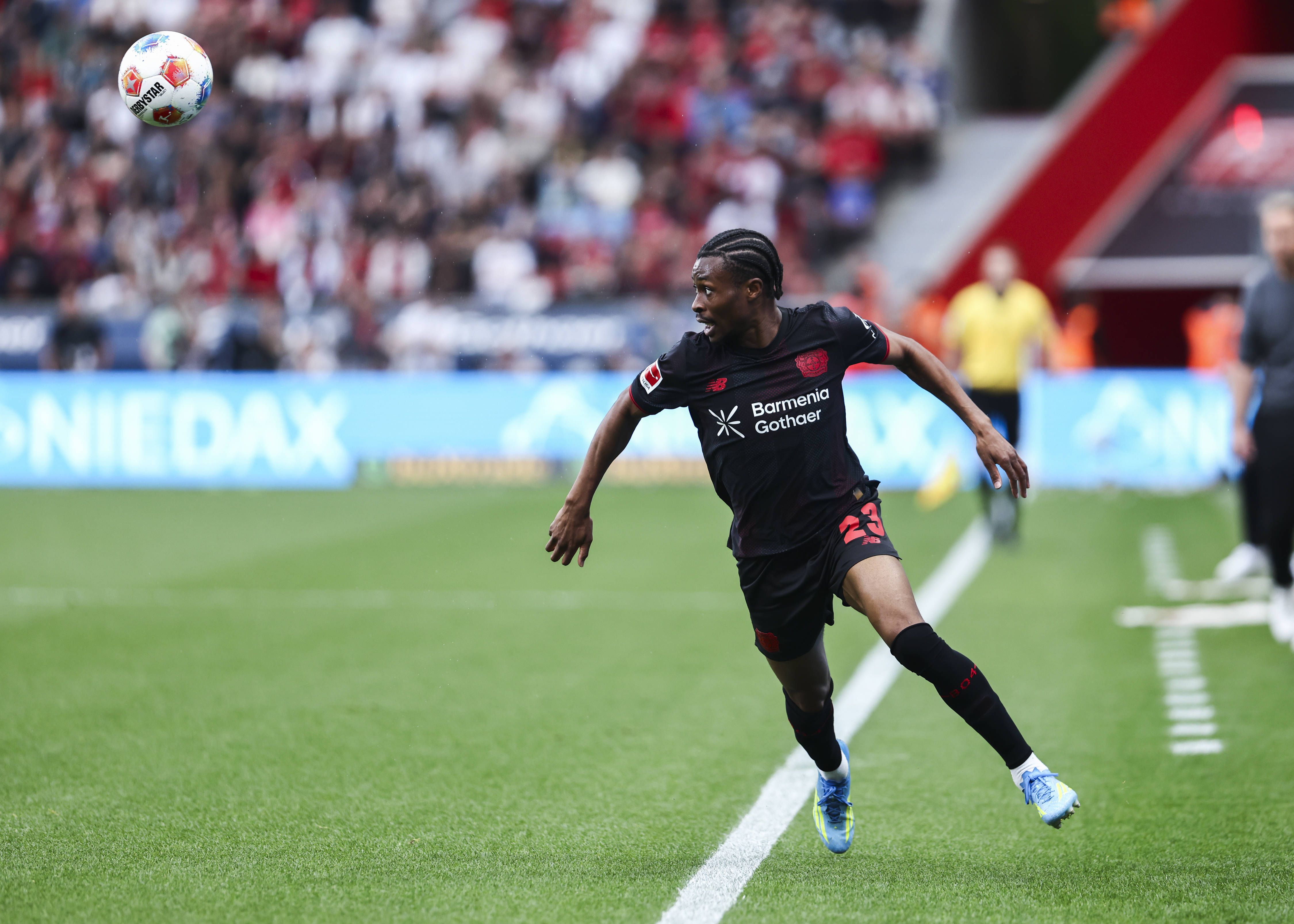 Nathan Tella of Leverkusen runs with the ball during the 1 Bundesliga match Bayer 04 Leverkusen vs RB Leipzig