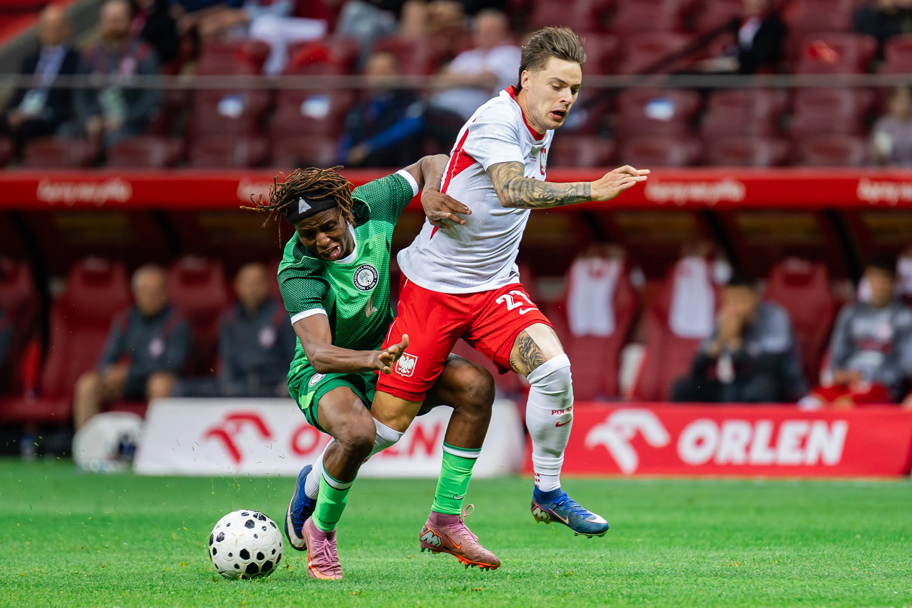 Poland Vs Nigeria during the friendly match in Warsaw, Poland Abdullahi Bewene L of Nigeria and Nicola Zalewski R of Poland are seen during the friendly match between Poland and Nigeria at PGE National Stadium