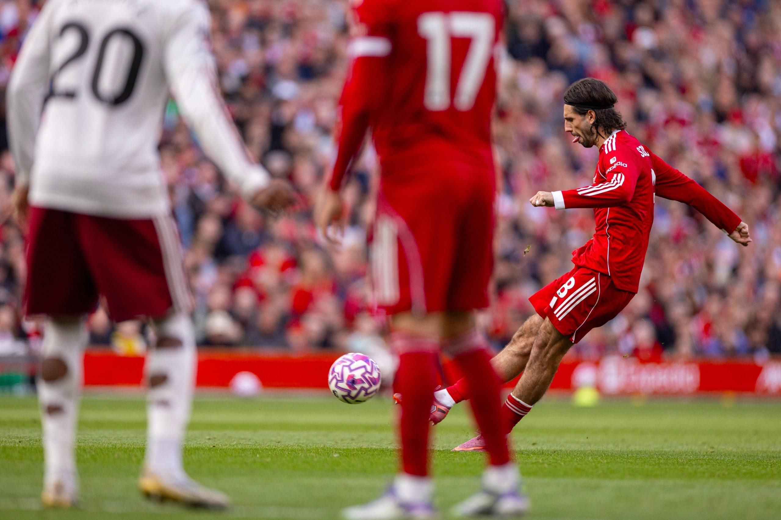 Liverpool s Dominik Szoboszlai shoots to score the first goal during the FA Premier League match between Liverpool FC and Arsenal FC