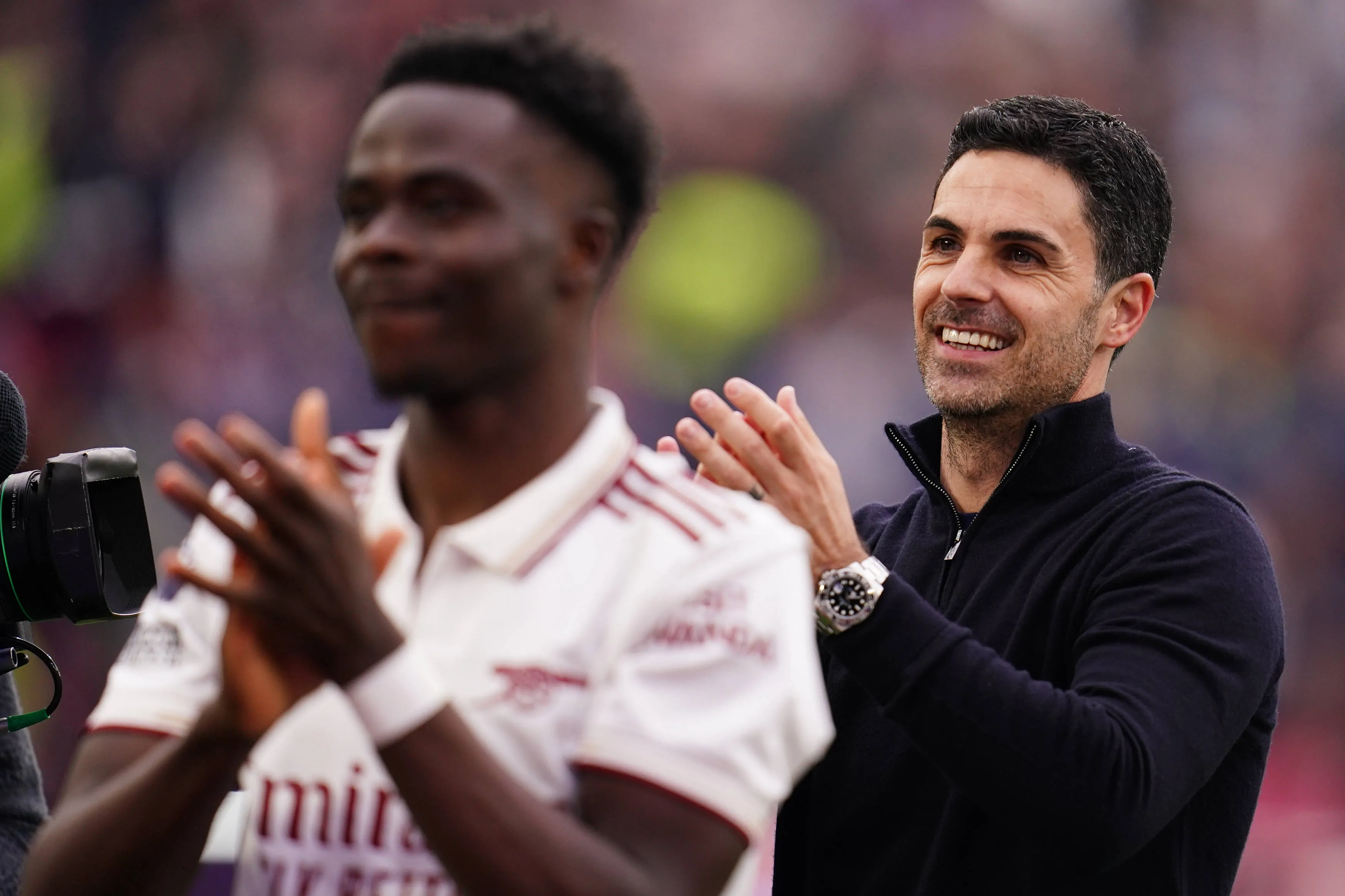 Arsenal Bukayo Saka and Mikel Arteta