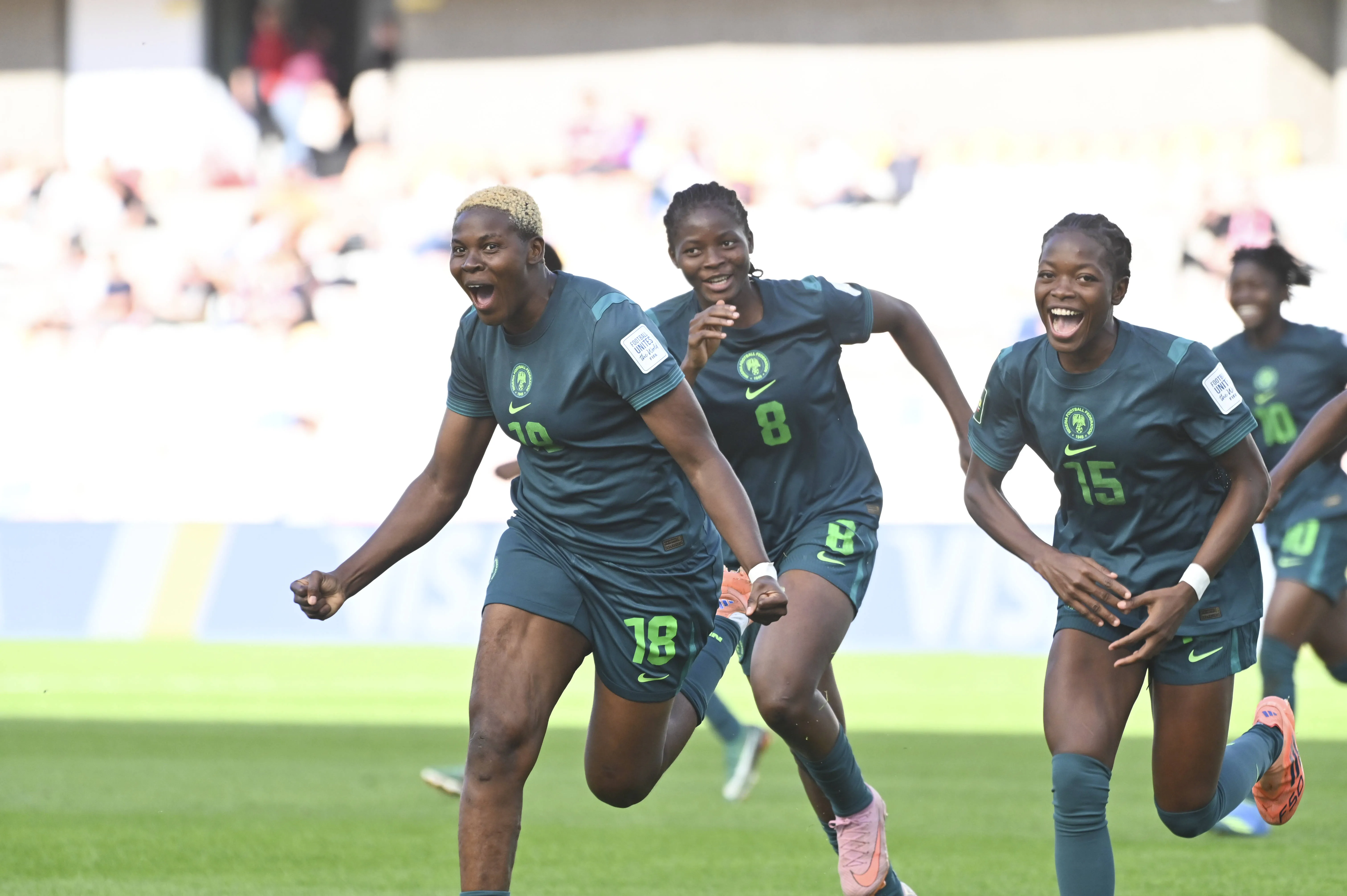 Seimeyeha Janet Akekoromowei celebrating after scoring a World Cup goal.