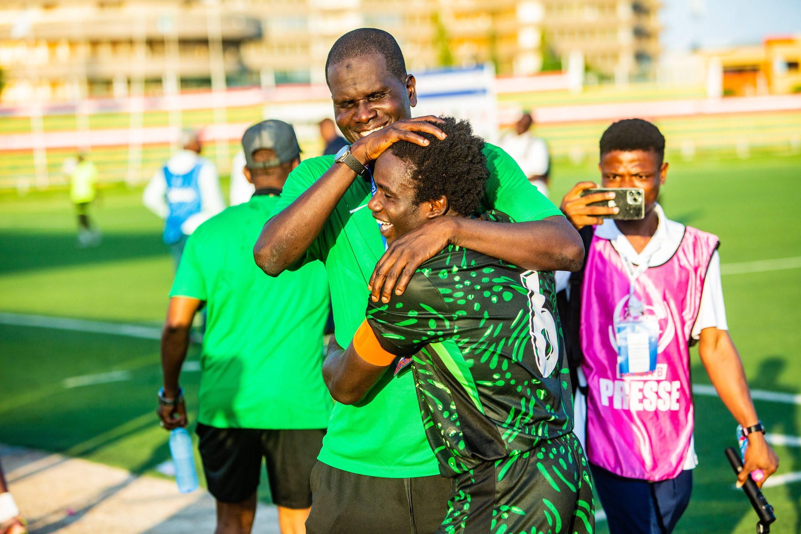 Nigeria Flying Eagles coach Aliyu Zubairu and captain Daniel Bameyi