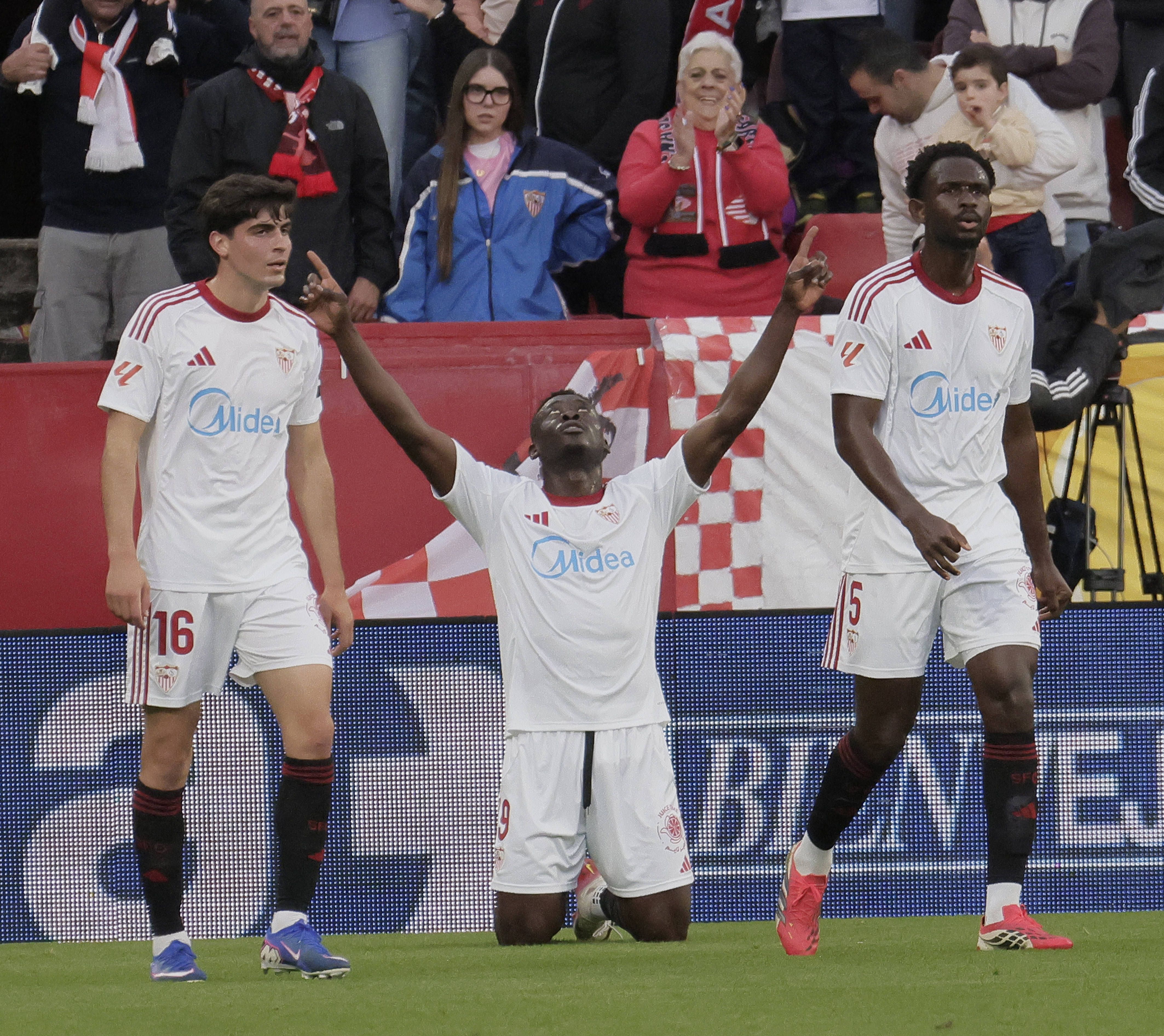 Akor Adams and Sevilla teammates