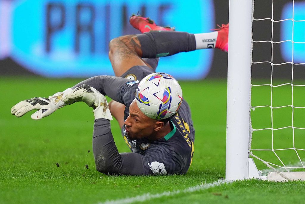 Maduka Okoye makes a save