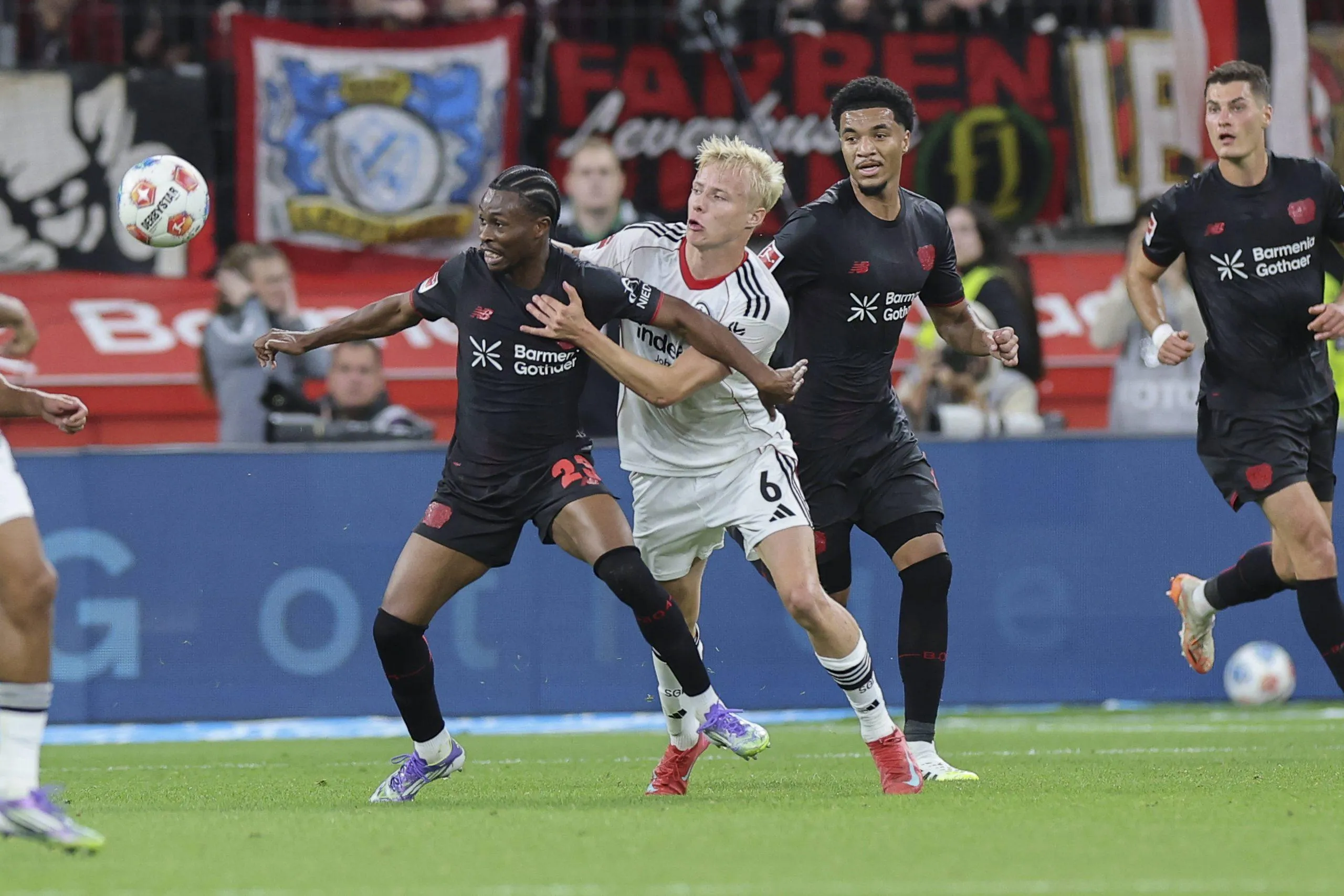 Nathan Tella under pressure for the ball from Eintracht Frankfurt player