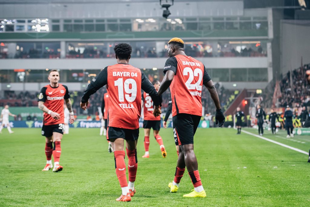 Nathan Tella and Victor Boniface in action for Bayer 04 Leverkusen