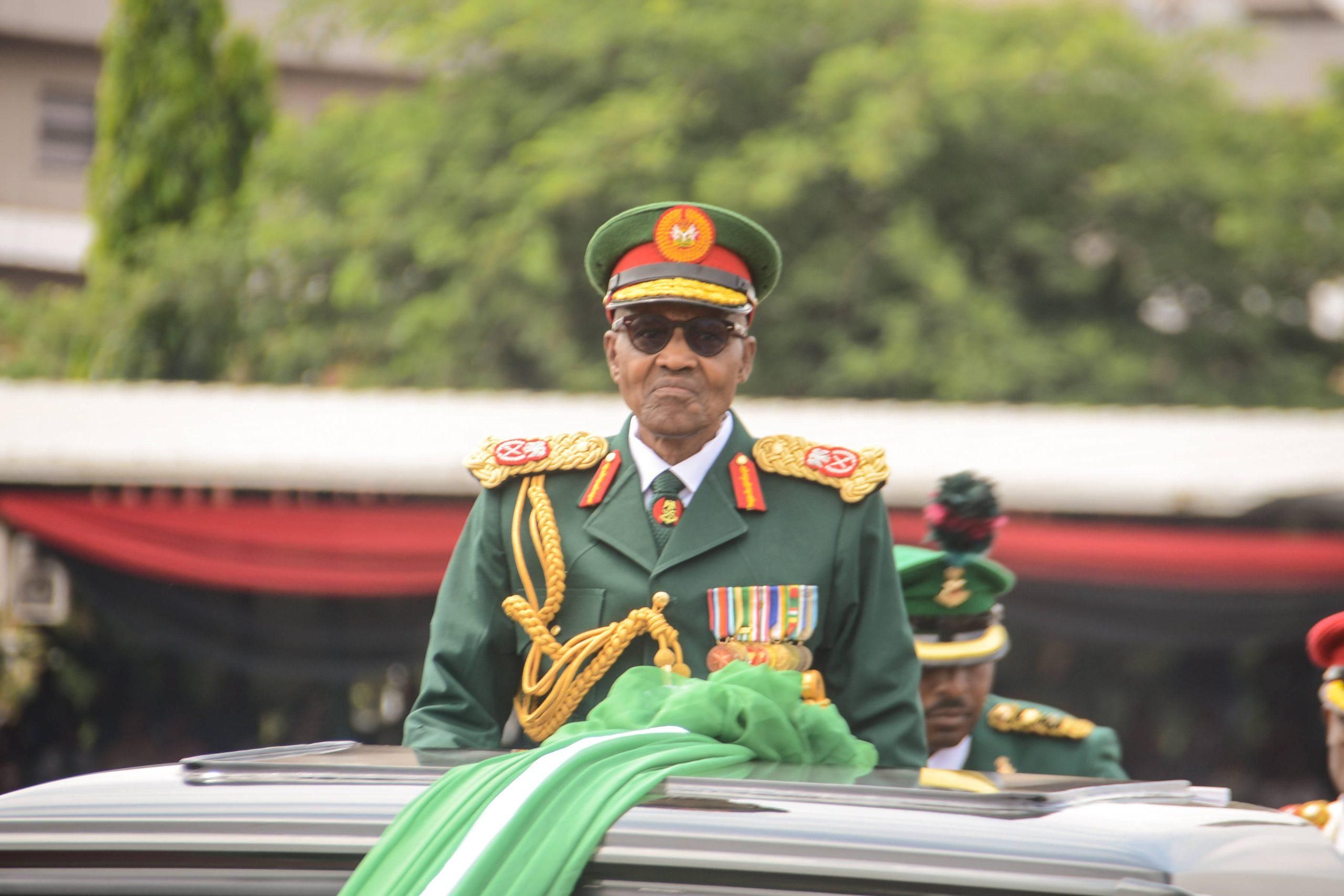 President Muhammadu Buhari attend the Nigerian Army trooping and presentation of colours parade, retiring and replacing 53 units regimental colours and issued 28 new ones for newly established units in Abuja