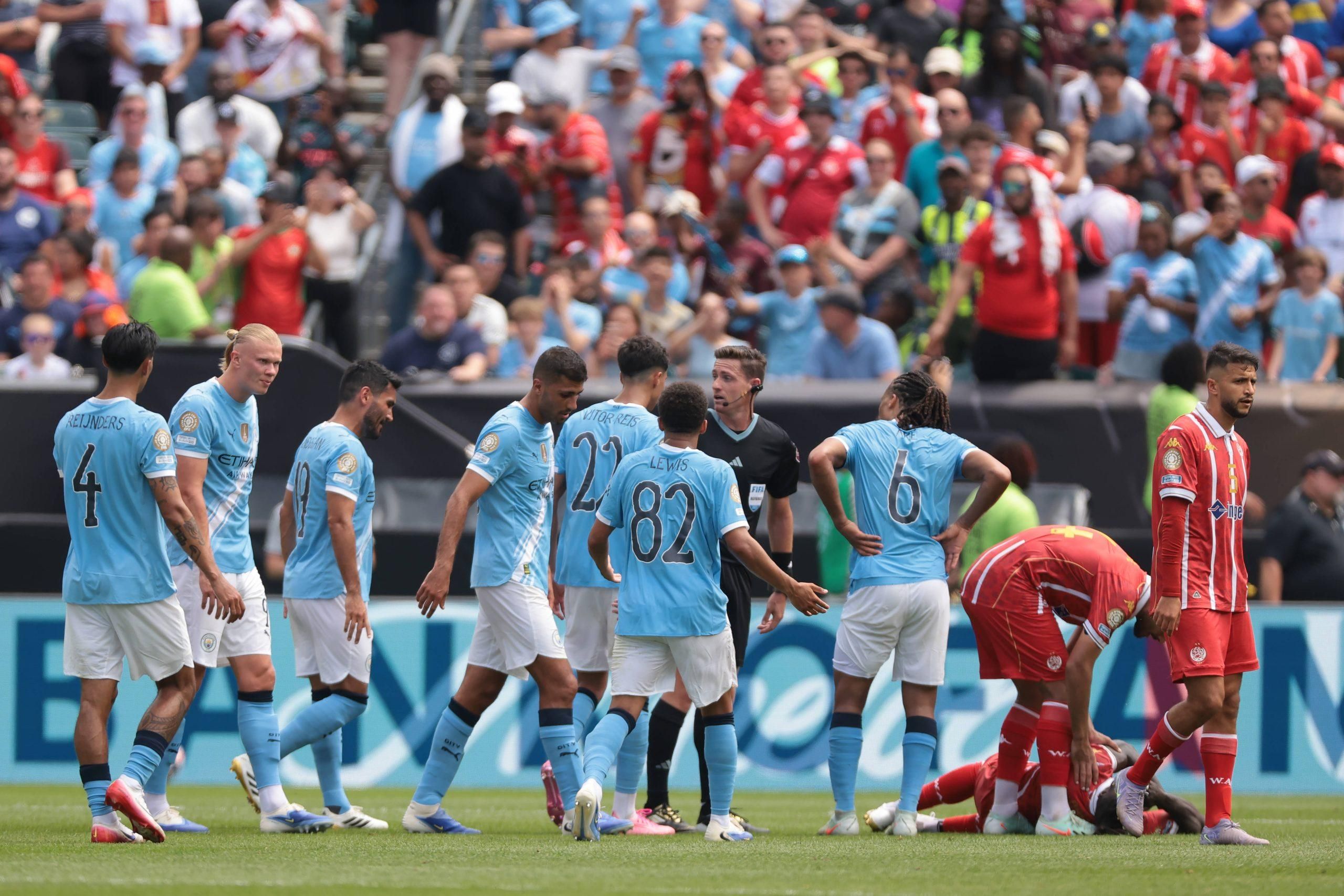 Rico Lewis reacts after being shown a red card by the Referee Ramon Abatti of Brazil during the Manchester City vs Wydad AC FIFA Club World Cup match at the Lincoln Field