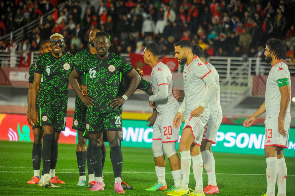 Akor Adams, Victor Osimhen and Yan Valery,Dylan Bronn and Ferjani Sassi of Tunisia during the Africa Cup of Nations AFCON match between Nigeria and Tunisia