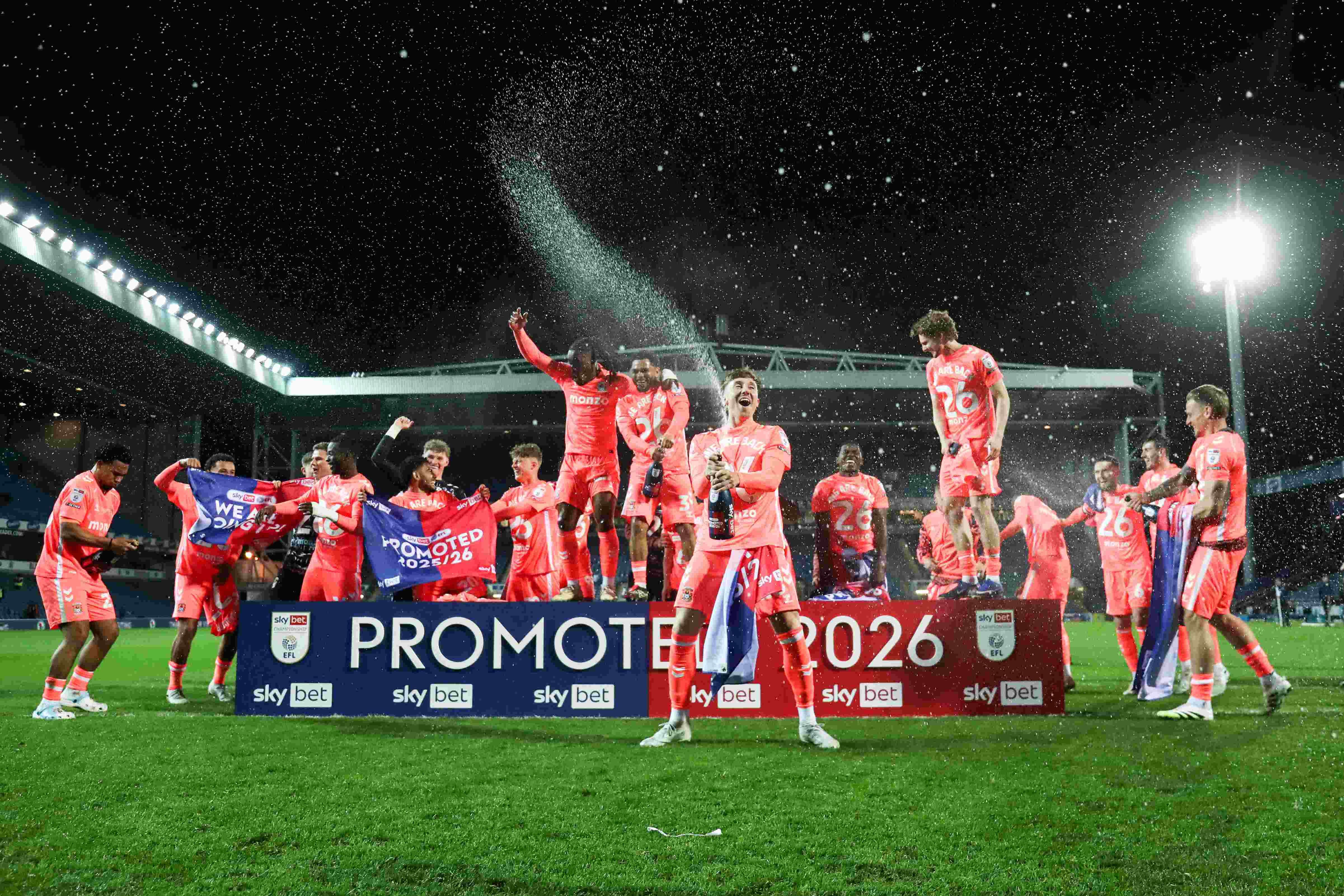 Coventry players celebrating promotion