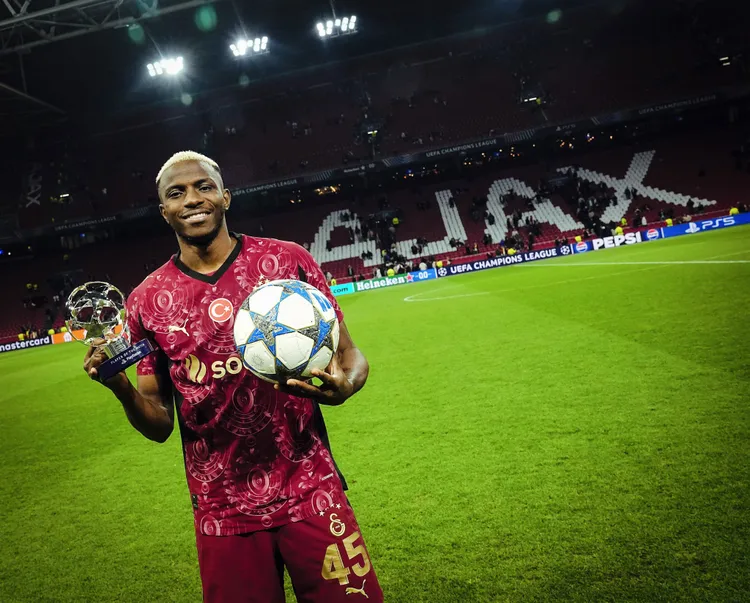 Victor Osimhen with the matchball after netting a hat-trick for Galatasaray against Ajax