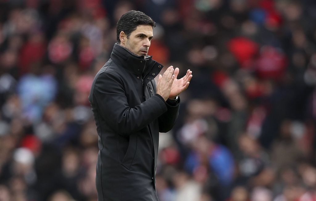 Arsenal manager Mikel Arteta clapping during a game in March 2025