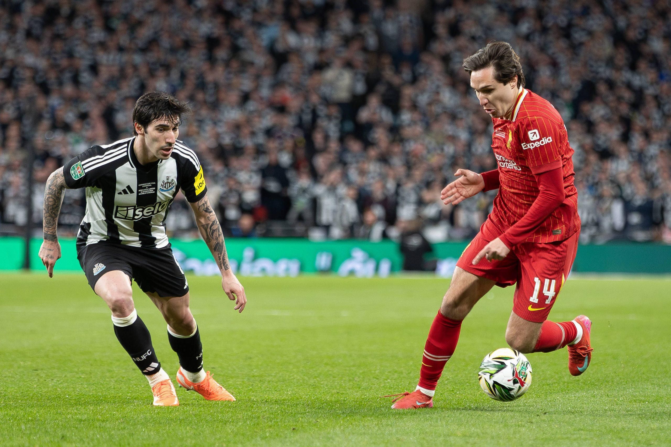Liverpool versus Newcastle United Federico Chiesa of Liverpool challenged by Sandro Tonali of Newcastle United 