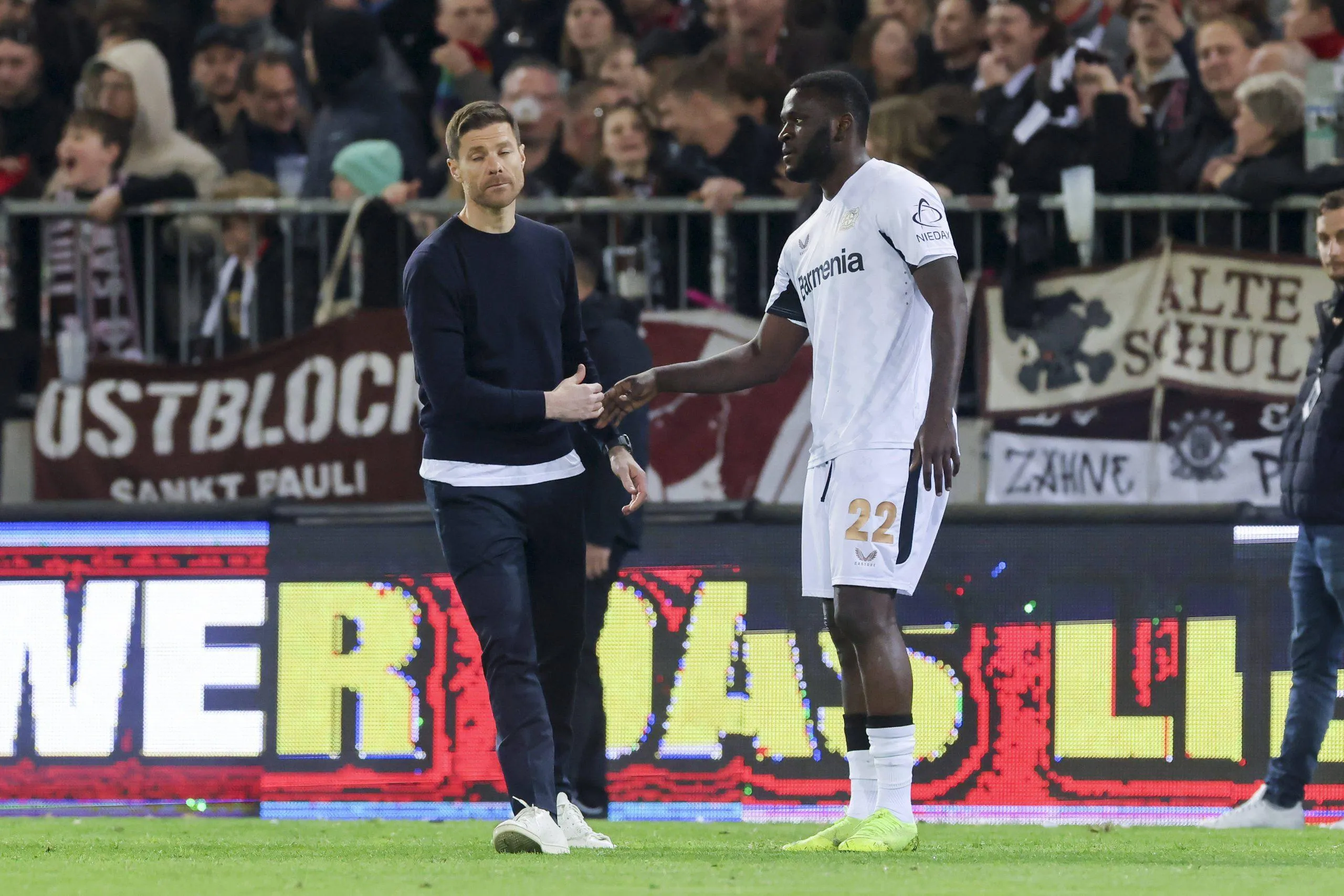 Xabi Alonso and Victor Boniface
