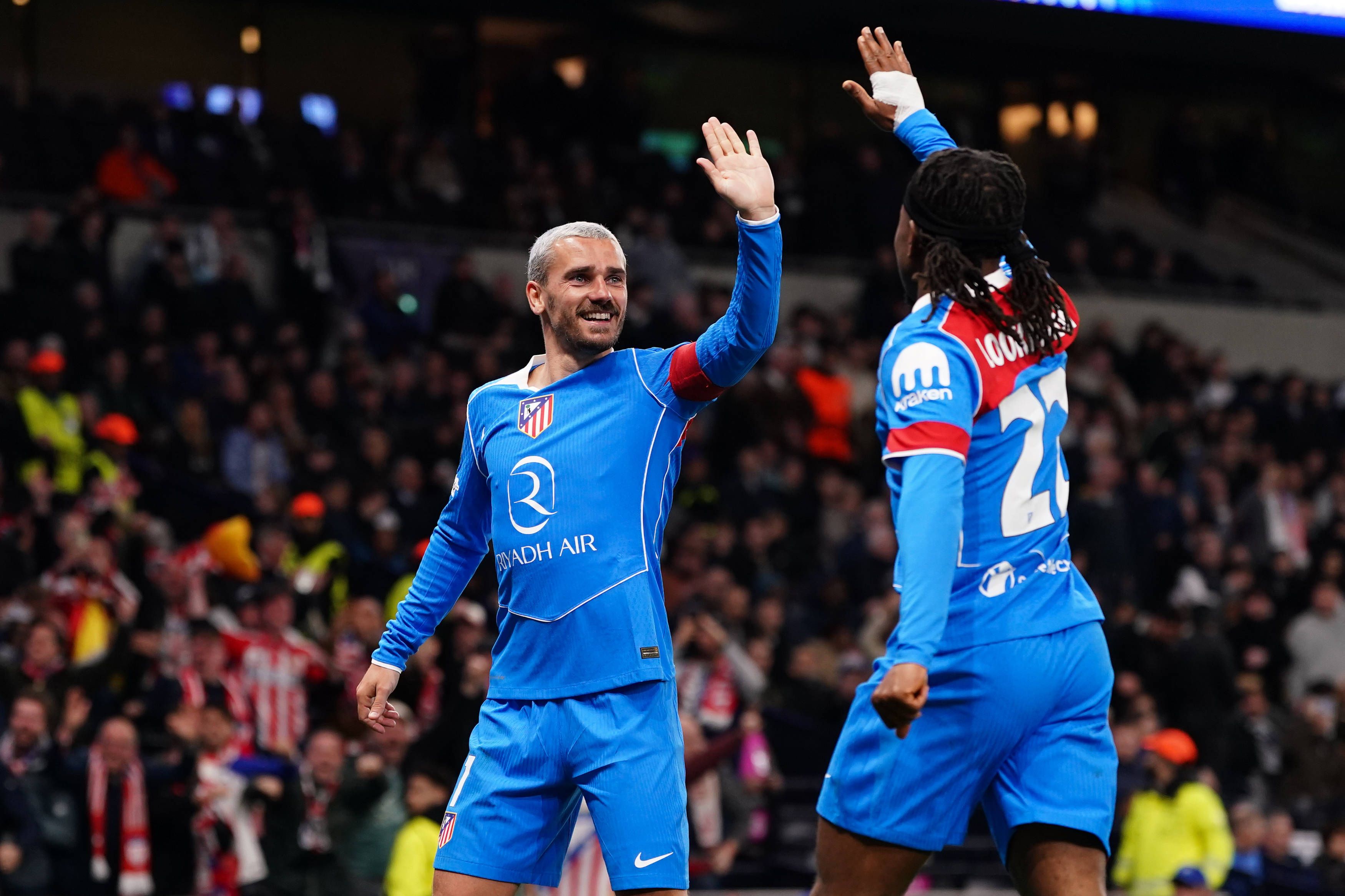 Antoine Griezmann and Ademola Lookman of Atletico Madrid