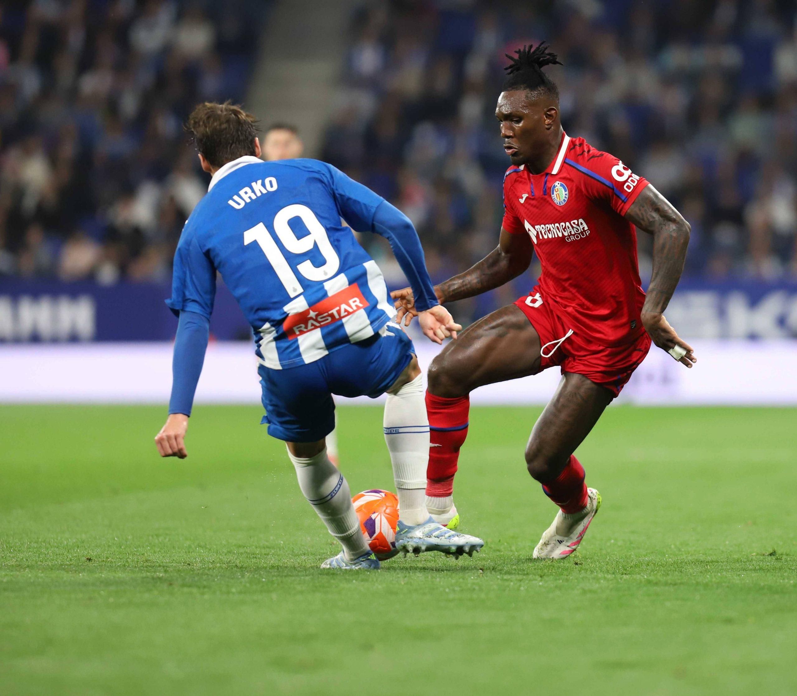 Urko Gonzalez Espanyol and Christantus Uche Getafe CF battle for the ball during the La Liga EA Sports between Espanyol and Getafe CF at RCDE Stadium