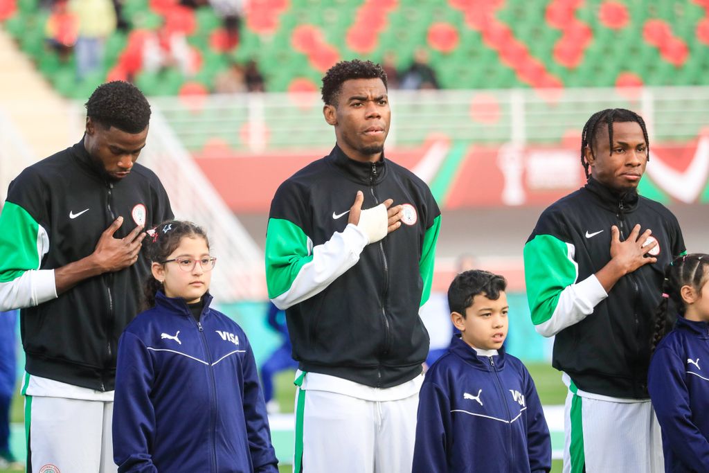 Ryan Alebiosu, Raphael Onyedika and Samuel Chukwueze during the AFCON 2025 match between Uganda and Nigeria