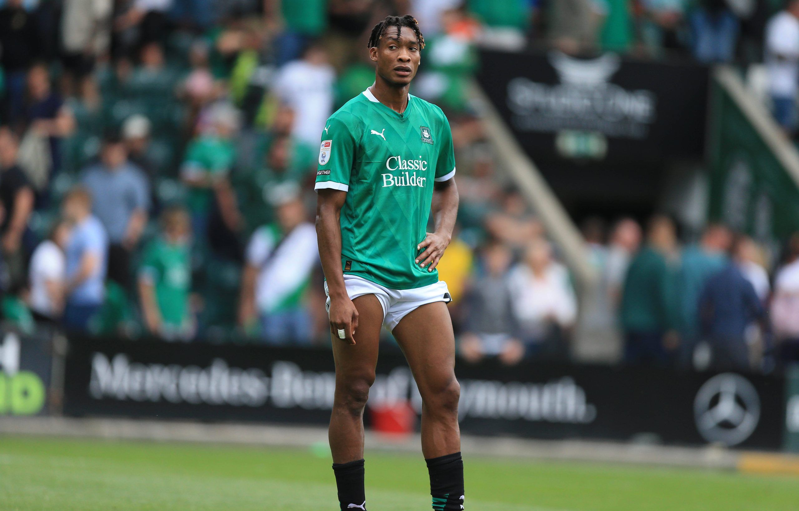 Muhamed Tijani in action for Wayne Rooney's Plymouth
