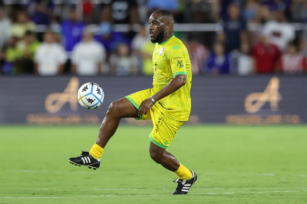 Jay-Jay Okocha with the ball