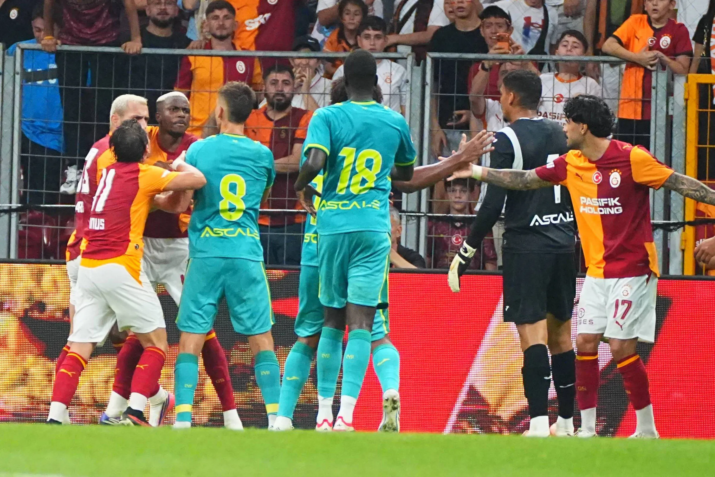 Galatasaray forward Victor Osimhen 45 aggressively confronted Villarreal defender Santiago Mourino 15 following an incident between the two players. The referee subsequently showed both players a yellow card during the during the pre-season friendly match between Galatasaray SK and Villarreal CF at Rams Park Stadium on August 8, 2026 in Istanbul, Turkey. 