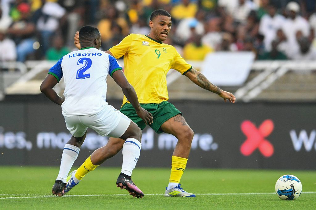 Lyle Foster and Motlomelo Mkhwanazi during the Men FIFA World Cup qualifiers between South Afria and Lesotho at Peter Mokaba Stadium on March 21, 2025 in South Africa