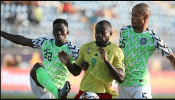 Omeruo and Troost-Ekong in action