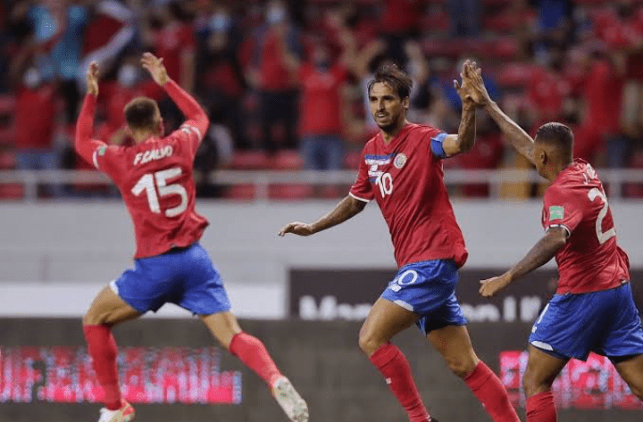 Captainn Bryan Ruiz celebrates with Costa Rican teammates
