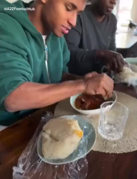 Karim Adeyemi, eating local Nigerian dish