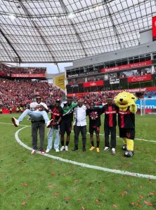 Victor Boniface and his friends celebrating the Bundesliga title 