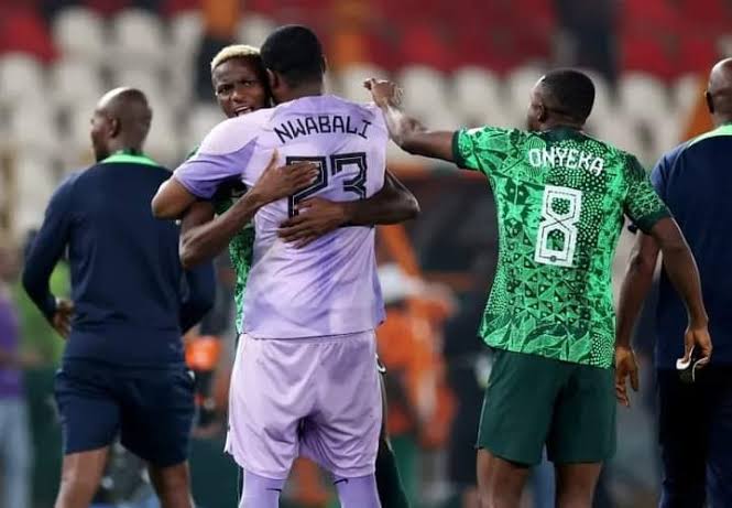 Nwabali hugs Osimhen at the 2023 AFCON in Cote d'Ivoire